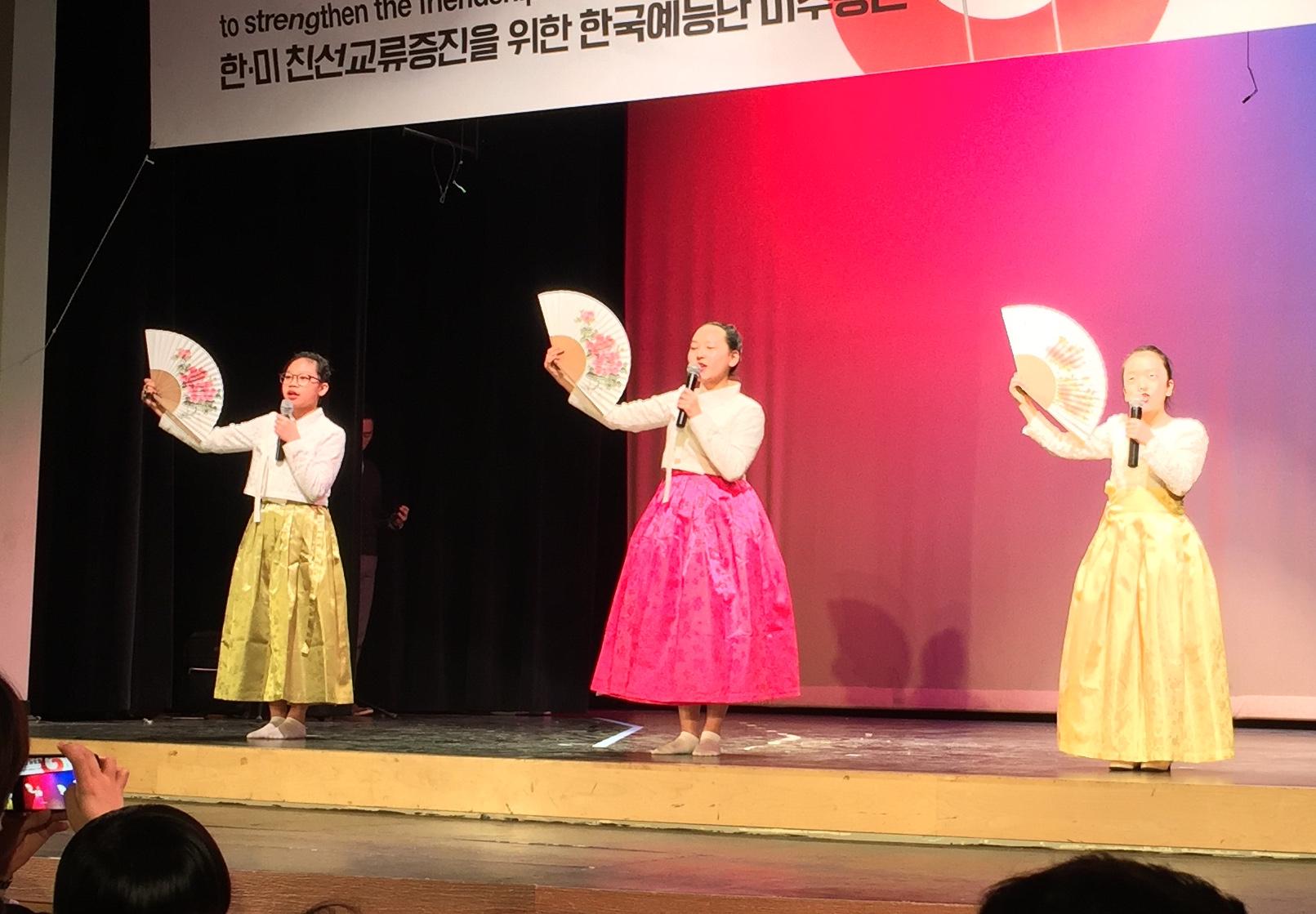 Korean students giving a speech